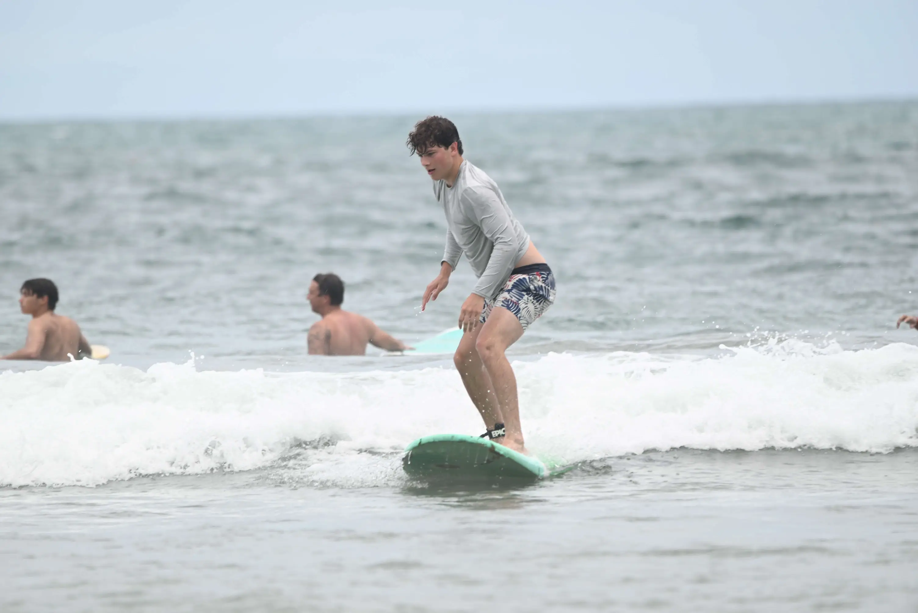 Semi-private surf lessons Costa Rica beginners on foam board