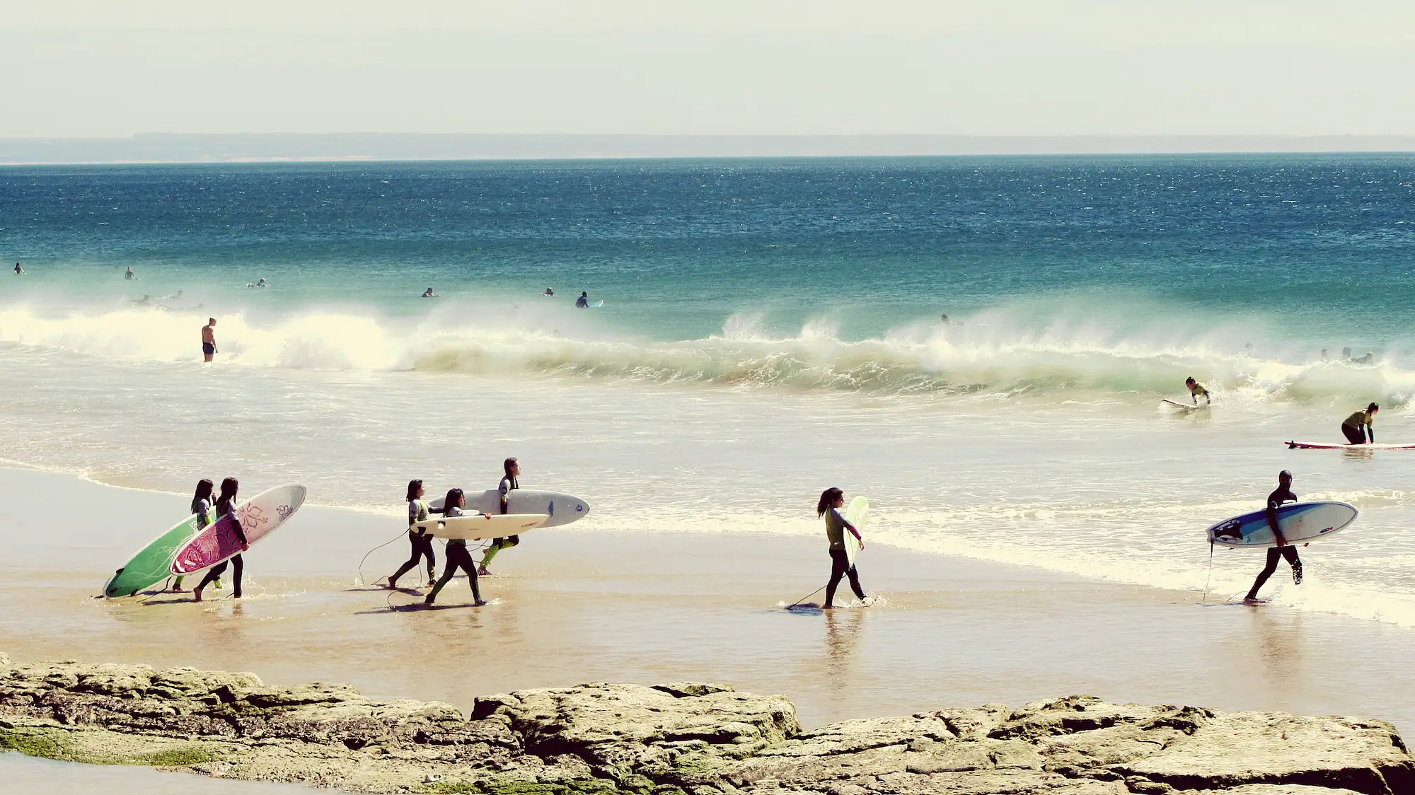 Group surf classes Tamarindo beginners learning pop-up technique