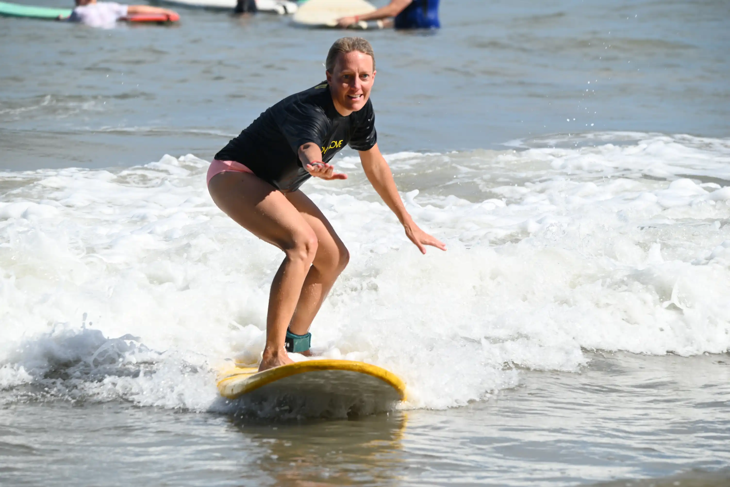 7-day surf camp Costa Rica certified instructor teaching a beginner