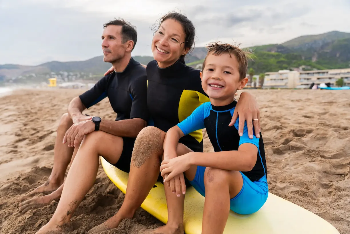 Pura Vida Surf School instructor briefing students on Tamarindo Beach